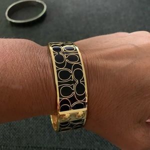 Wide coach black and gold bangle